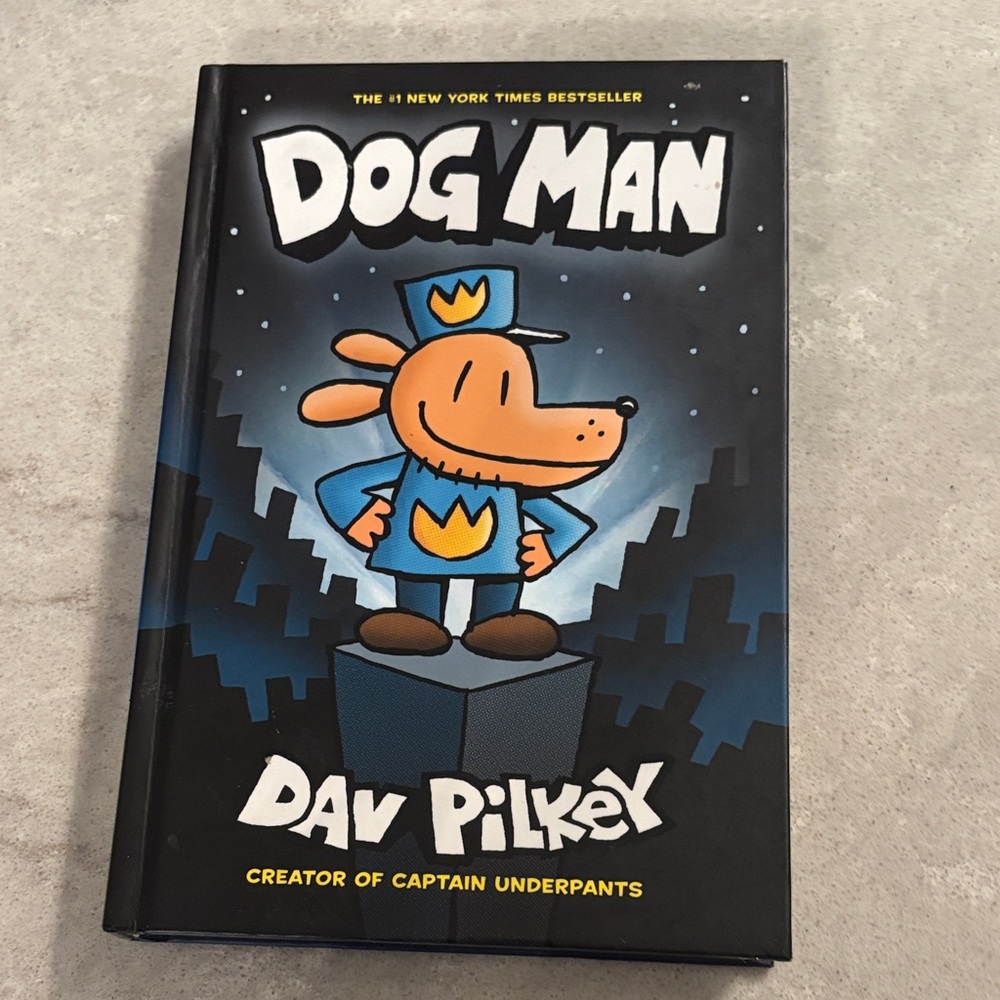 Dog Man by - Black Hardcover